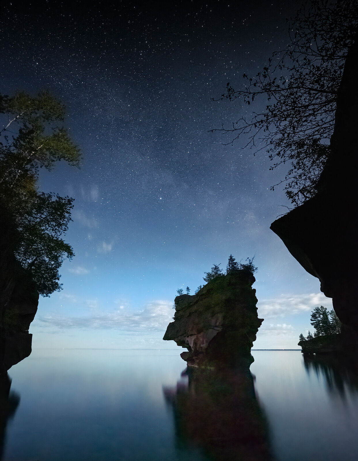 sea stack on stockton island in the apostles under a starry night sky